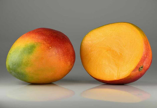 Photo of sliced Mango. Mango butter is an important ingredient in many skincare products.