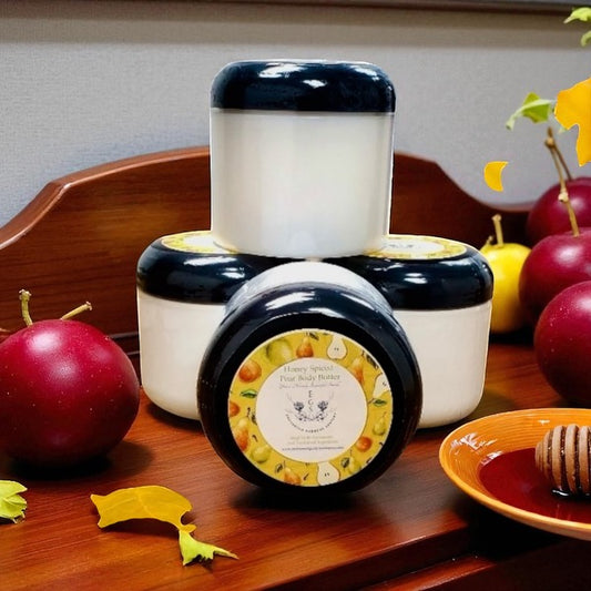 Three jars of Honey Spiced Pear Body Butter from Enchanted Gardens Soapery.